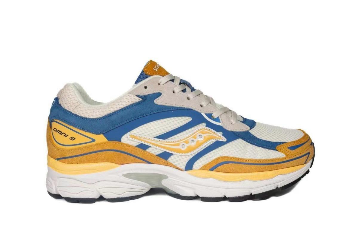 Saucony ProGrid Omni 9 Bleu et Jaune - Sneakers rétro running dynamique - nbaddict.fr
